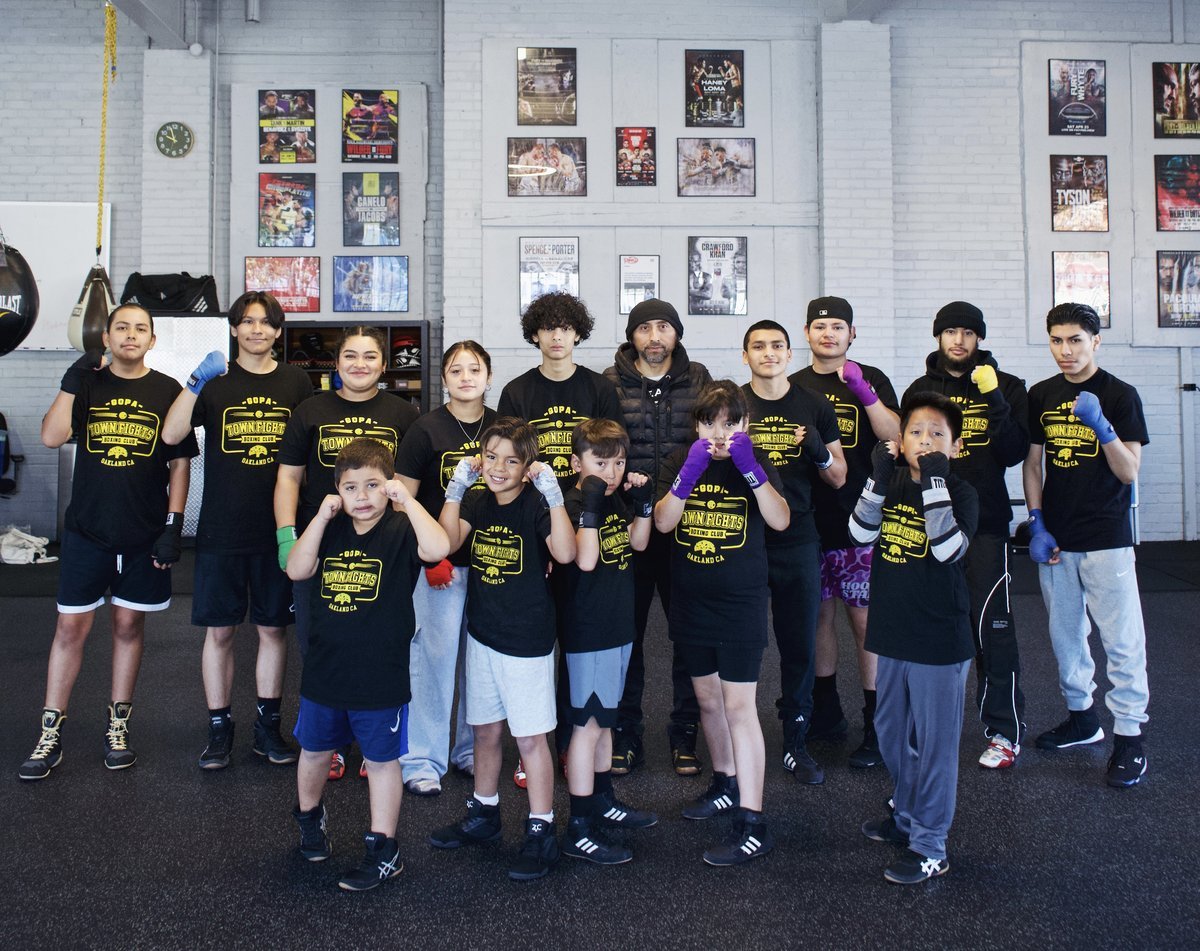 Coach Alfredo Gopa and his boxing team Oakland