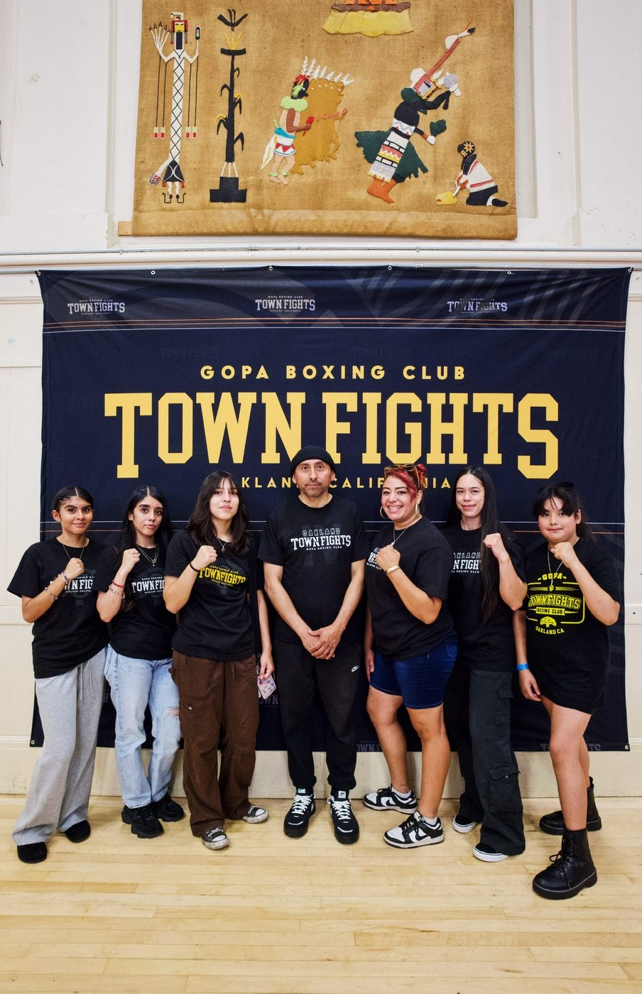 Gopa Boxing Club team at the Town Fights banner in Oakland