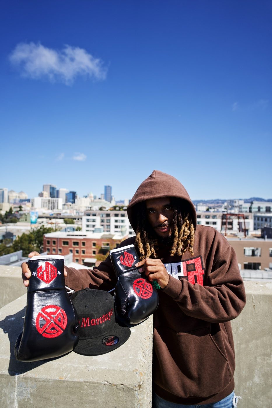 Gopa boxer with custom gloves above downtown Oakland