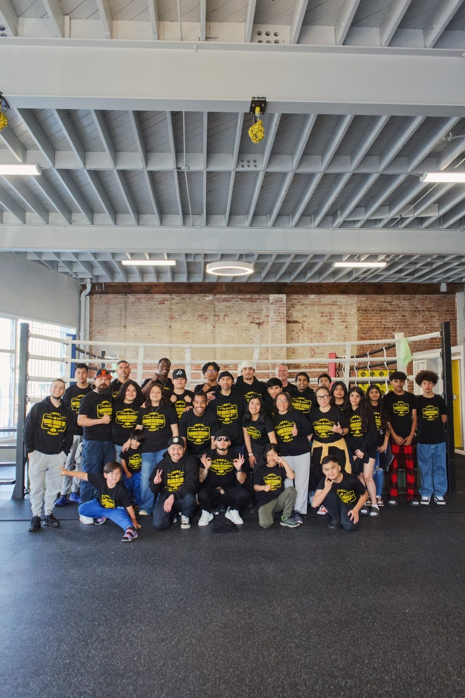 Full Gopa Boxing Club team photo in the Oakland gym