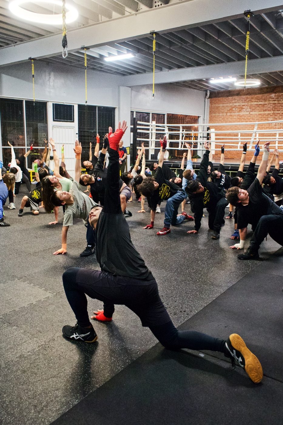 Group warm up and stretching at Gopa Boxing Club Oakland