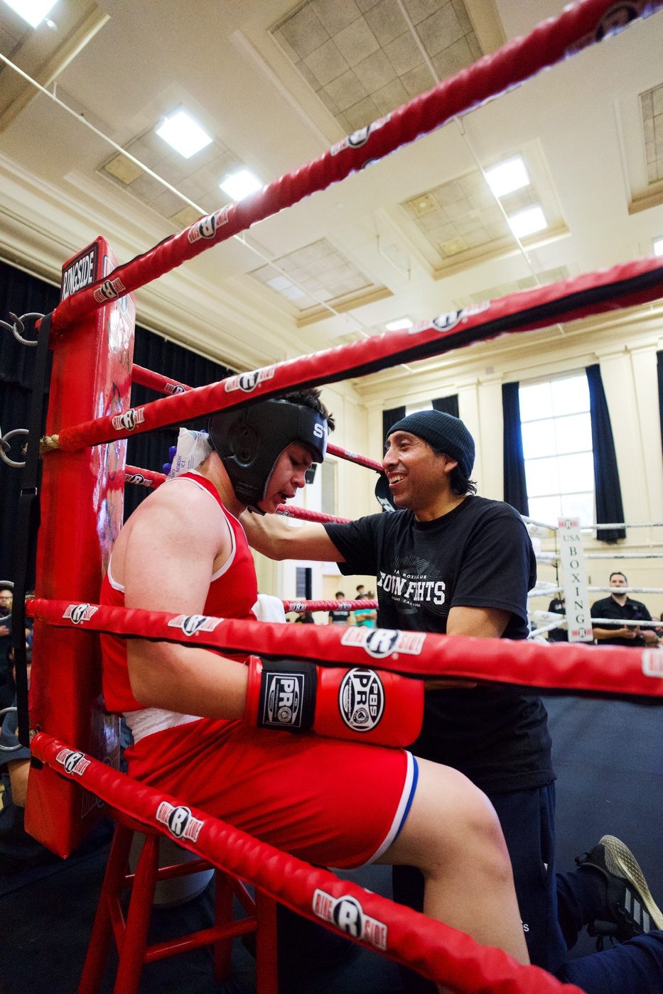 Coach working the corner between rounds at Town Fights